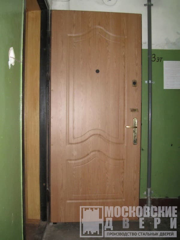 Утеплённая дверь для квартиры с отделкой МДФ